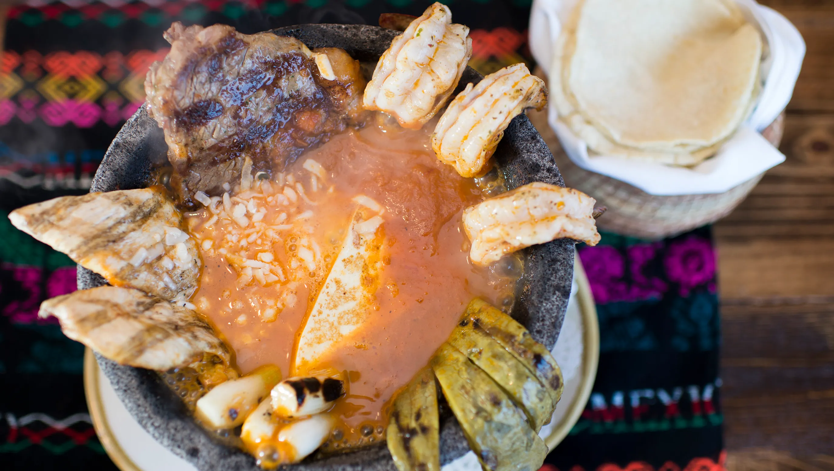 Cielito Lindo signature dishes Molcajetes ToltecaBeef TaquitosTopokiles (Chilaquiles)